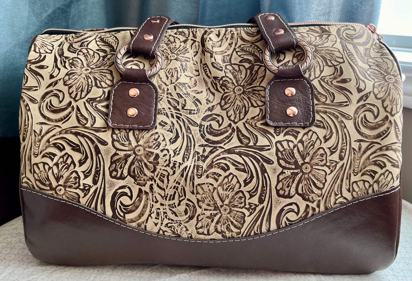 Chocolate Floral Embossed Barrel Bag