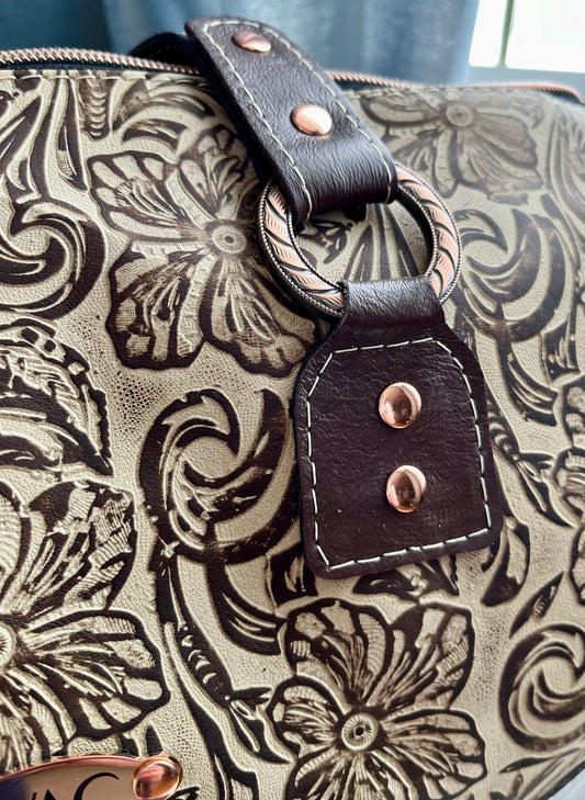 Chocolate Floral Embossed Barrel Bag